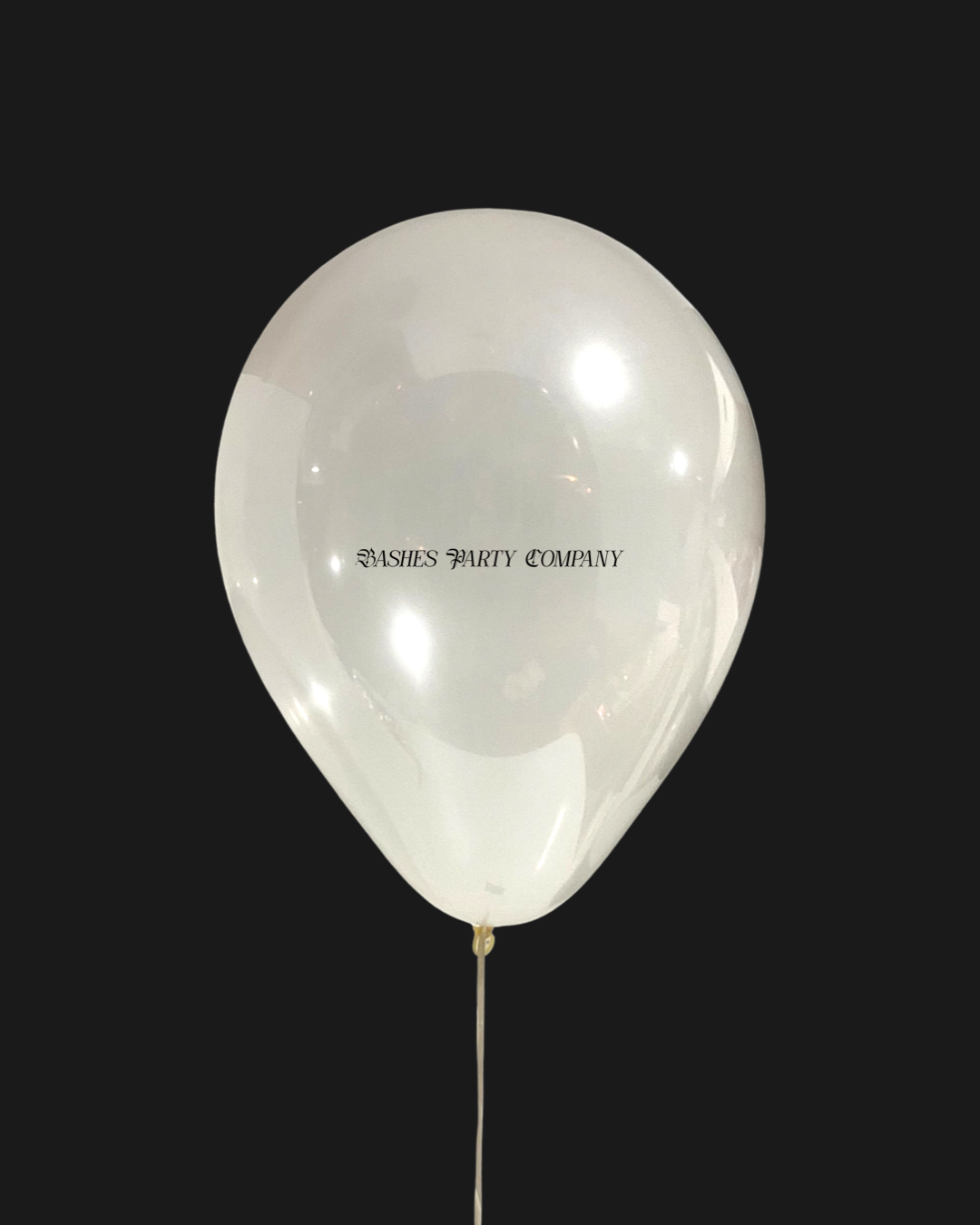 Clear balloon with 'Bashes Party Company' text on a black background
