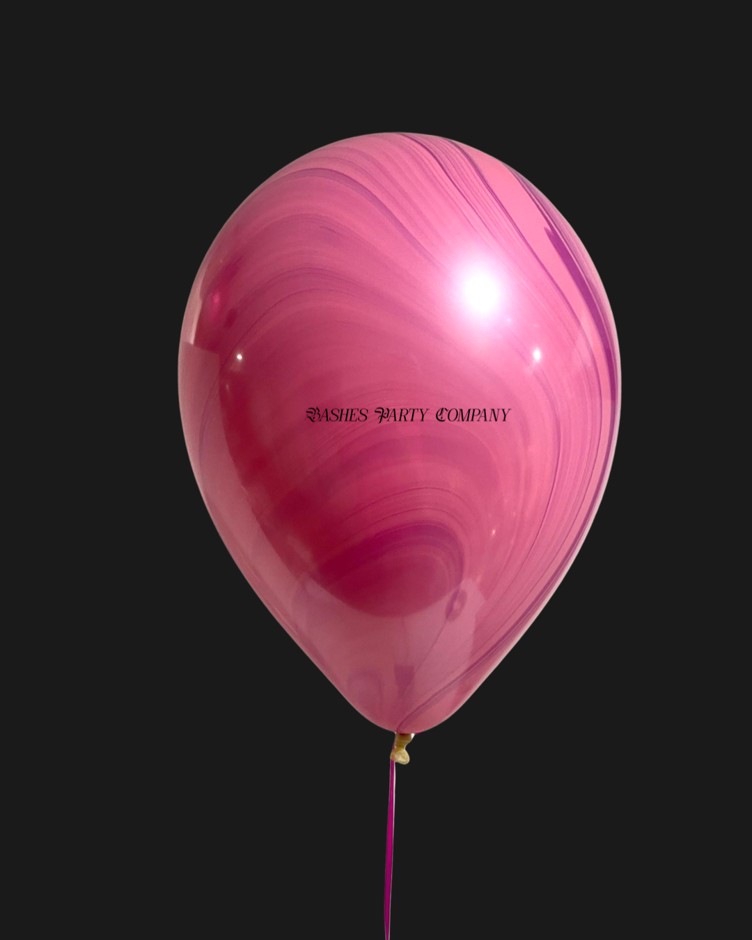 Pink marbled balloon with 'Bashes Party Company' text on a black background