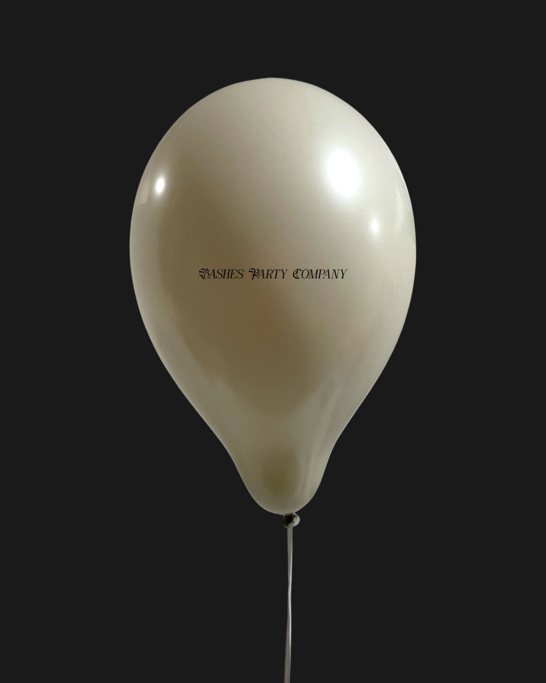 White balloon with 'Bashers Party Company' text on a black background