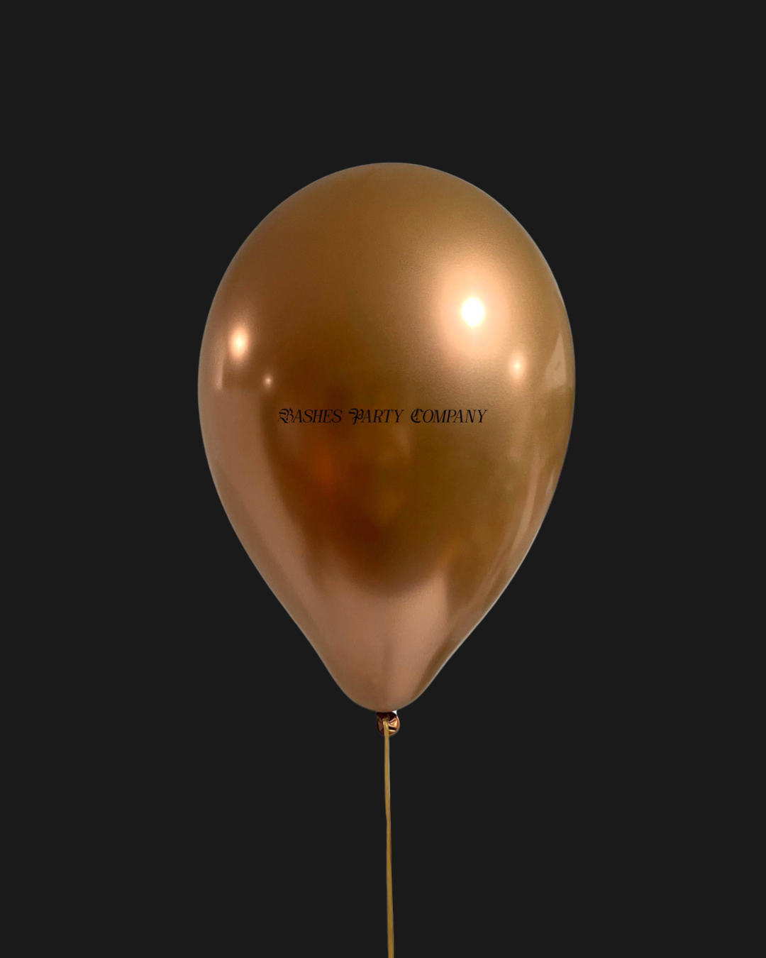 Gold balloon with 'Bashes Party Company' text on a black background